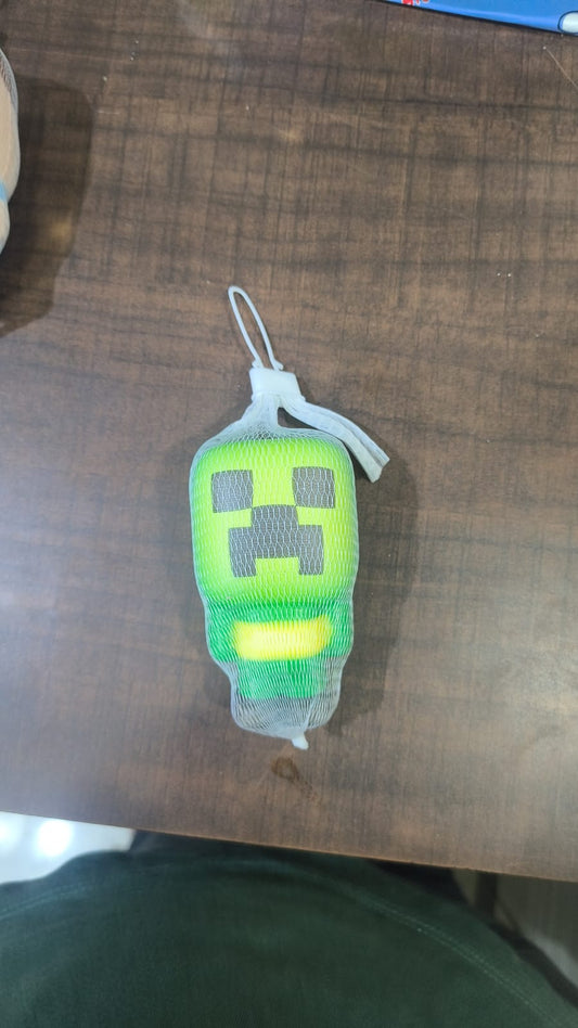 Green Pixel Monster Figure